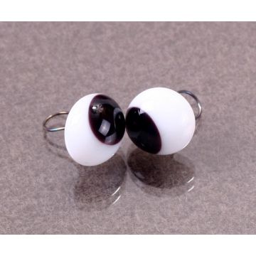 Squinting glass eyes